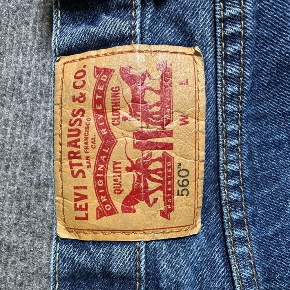 Levis 560 Comfort Fit Tapered Leg Jeans Mens 46x30 Blue Denim Medium Wash